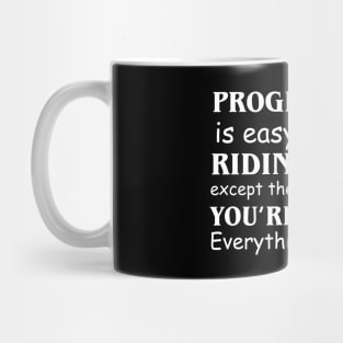 Programming Is easy. It's like riding a bike except the bike is on fire You're on fire Everything is on fire Mug